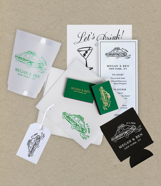 Wedding stationery set with taxi-themed design on a beige background
