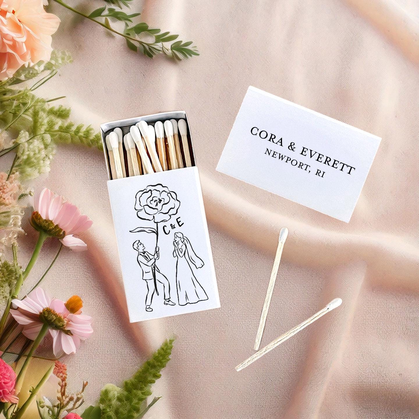 Couple with Giant Flower Matchboxes: Personalized Whimsical Wedding Favors